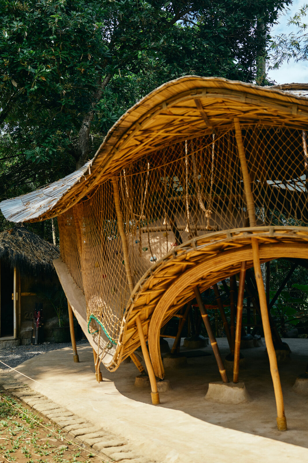 A curved bamboo pavilion at The Kul Kul Farm.