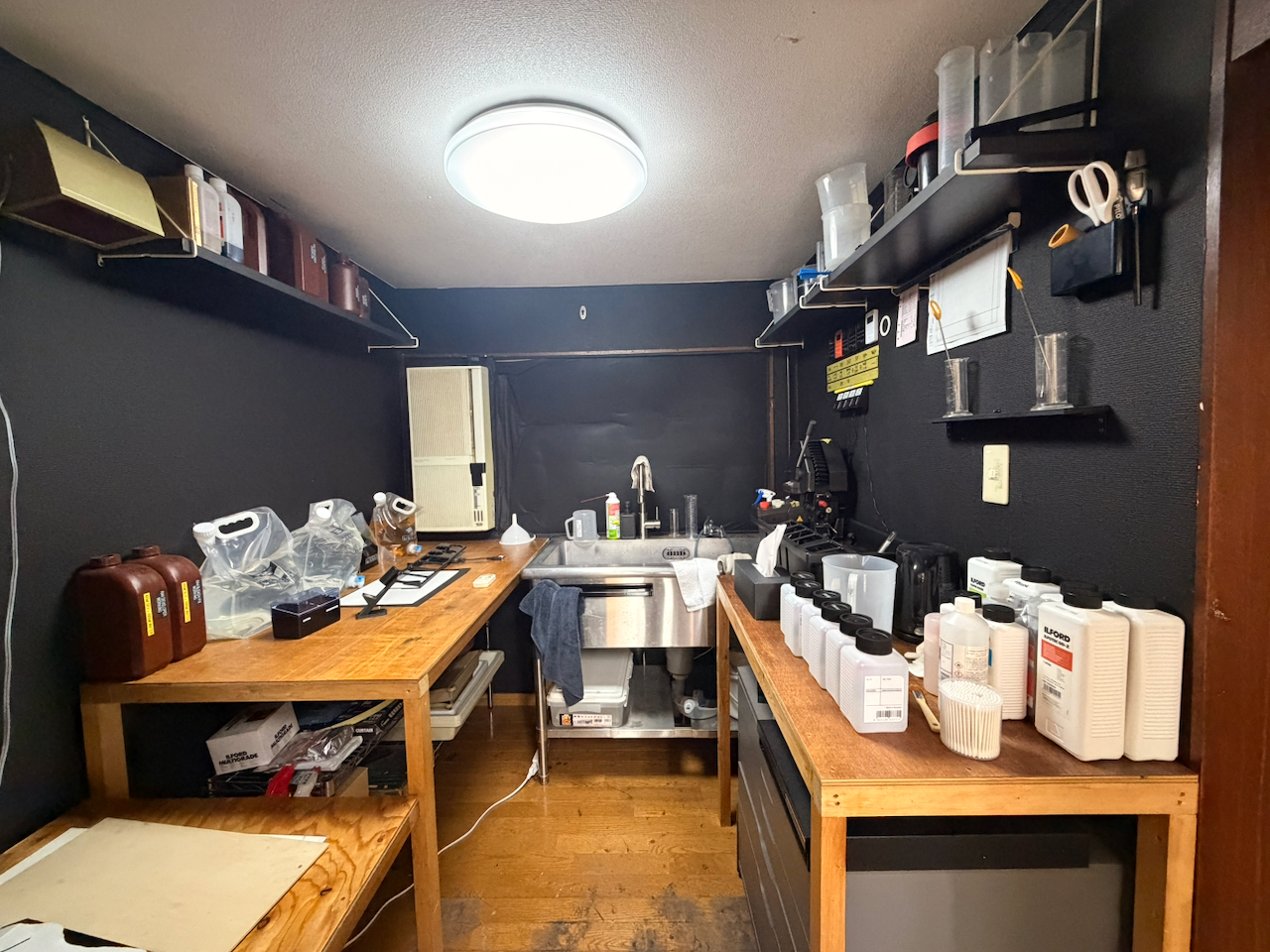 The darkroom sink, chemistry, and work surfaces