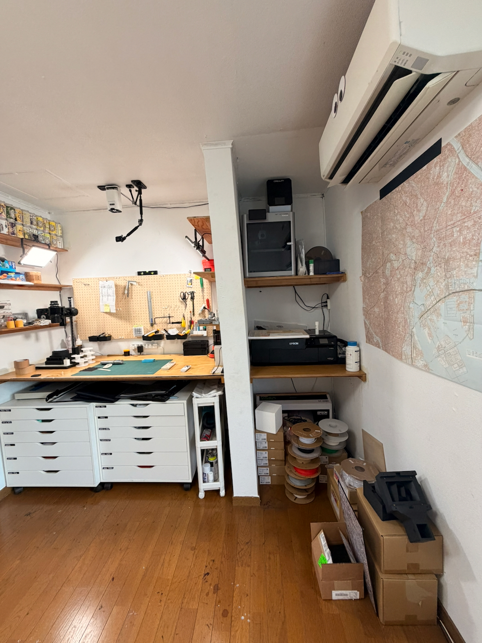 The workbench, wall map, and storage