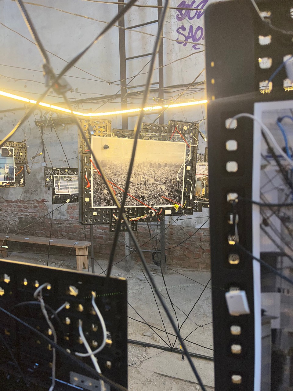 A close view through the cables and frames of the installation
